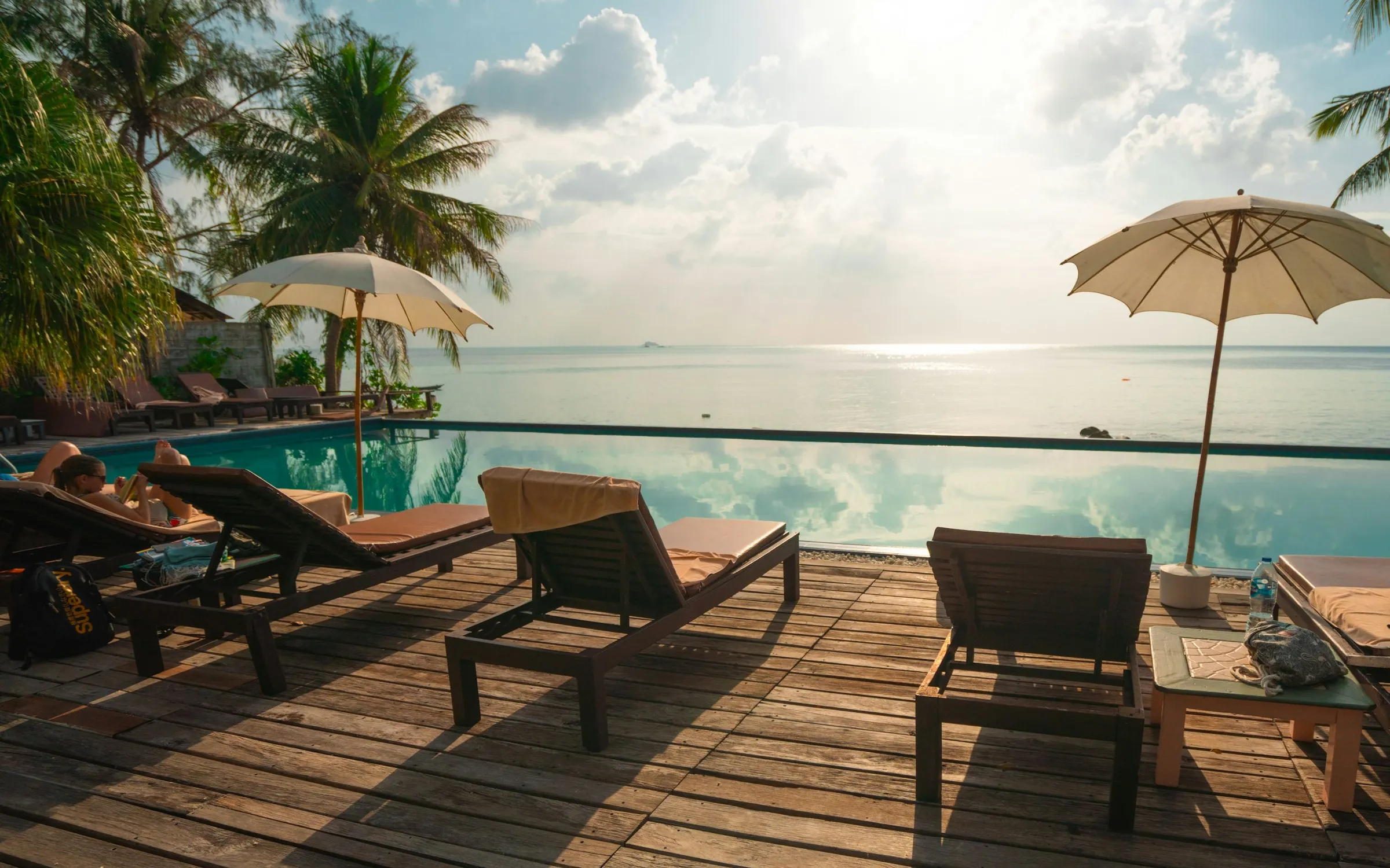 FrameHotel's cliffside terrace overlooking the Pacific at golden hour